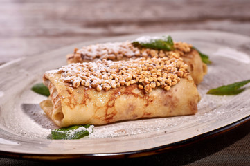 restaurant dish on white and gray plates, on a table