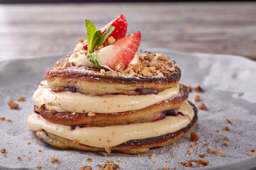 restaurant dish on white and gray plates, on a table