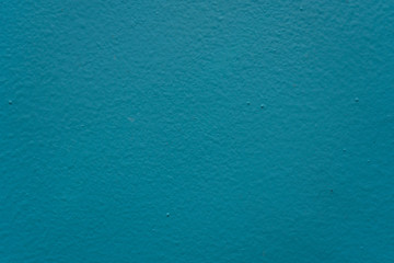 Turquoise color background. Texture of painted wall. Background or texture with place, space for text.