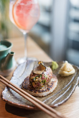 Asian Style Beef Tartare with Pan-Fried Rice Cake and Black Truffle