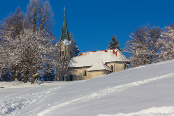 Fototapeta na wymiar Church in snow