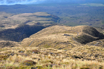 Hiking path and volcanic landscape at Tongariro Alpine Crossing, Tongariro National Park, North Island, New Zealand.