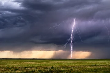 Fotobehang Lightning bolt from a thunderstorm © JSirlin