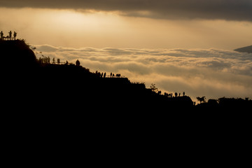 Fototapeta premium Scenic view of clouds and mist at sunrise