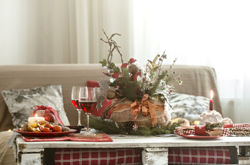 Beautifully decorated Christmas table in the living room.