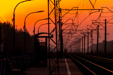 Fototapeta na wymiar colorful sunset on railway