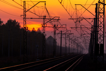 Fototapeta na wymiar lilac sunset on railway