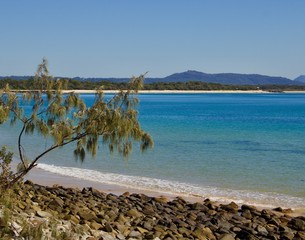 Beautiful view of sea with rocks in foreground
