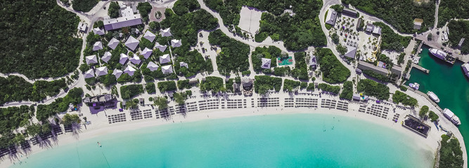 Drone view on beautiful sandy beach Half Moon Cay Bahamas 
