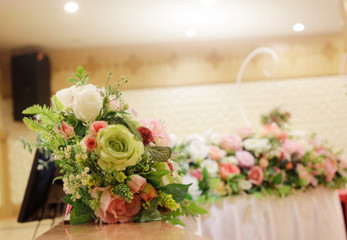 Blur the flowers used to decorate the stage on the wedding.
