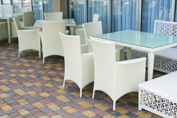 chairs and tables in the summer cafe