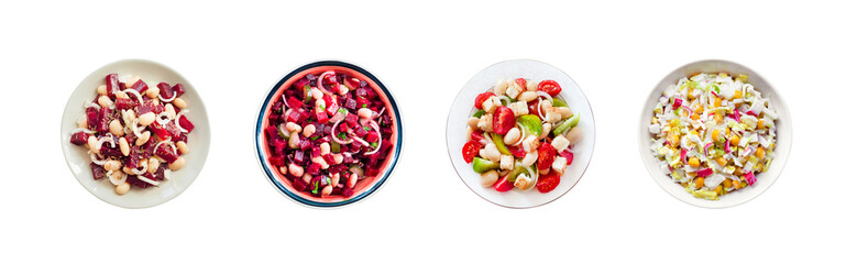 Collage of salads on a plates isolated on white background. Top view, flat lay