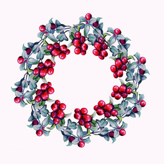 Obraz premium wreath of red berries with green leaves