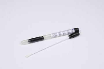 Veneric disease test tube with brush tool