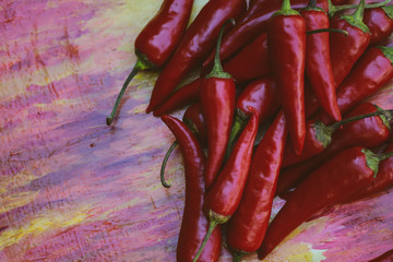  a lot of red pepper piled on the table