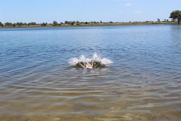Man jumping into the water
