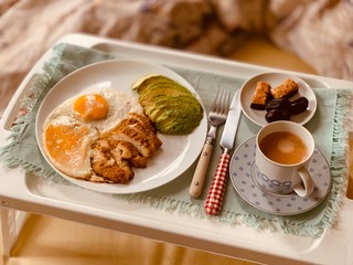 breakfast with fried eggs, chicken and bacon