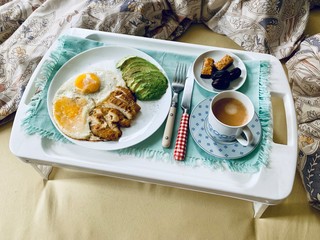breakfast with fried eggs, chicken and bacon