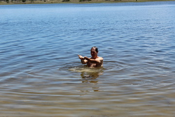 Mature man in water