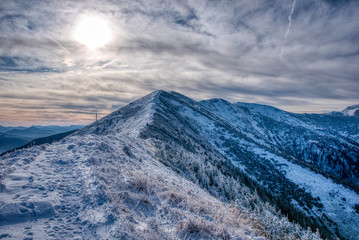 Fototapeta na wymiar Mountains with snow and beautiful sky whit sun , slovakia
