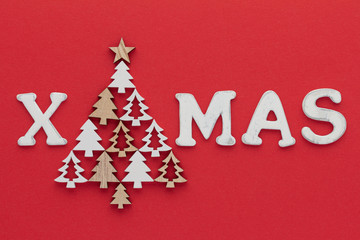 Fototapeta na wymiar Christmas composition. Wood fir star top view background with copy space for your text. Flat lay.