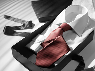 a shirt and tie inside the gift box