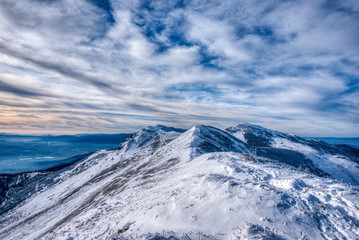 A beautiful clear day in the mountains with beautiful snow-covered hills, Mala Fatra, Slovakia