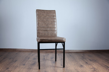 Brown leather chair in studio