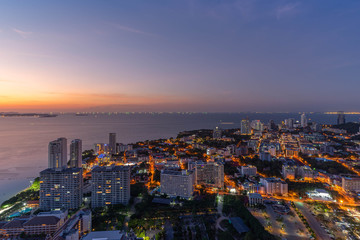 Fototapeta na wymiar At night, the beach view and Pattaya city building at Pratumnak Viewpoint, Pattaya, Thailand
