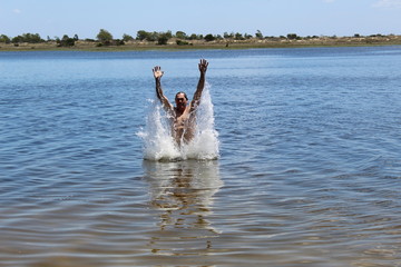 Man jumping into the water