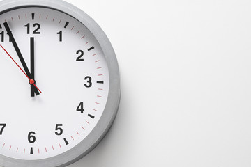 5 to 12 clock concept on white background