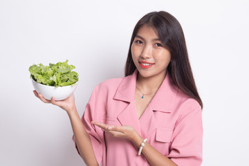 Healthy Asian woman with salad.