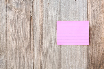 blank note paper on wooden background