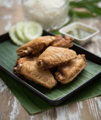 Fried Chicken Wings on wood table,Thai food