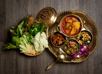 Various of Thai food on a wooden table, top view