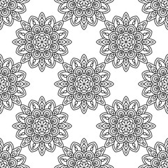 Fototapeta premium Fantasy seamless pattern with ornamental mandala. Abstract round doodle flower background. Floral geometric circle. Vector illustration. 