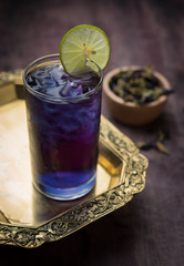 Butterfly pea juice with lime in cold glass, Anchan Thai flower