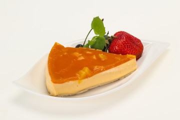 Cheesecake with apricot served strawberry