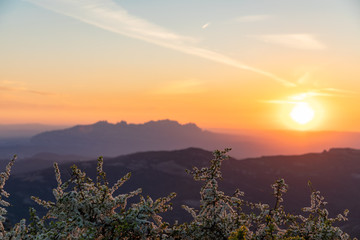 Views at sunset of Montserrat silhouette with blue and orange sky in Catalonia, Spain