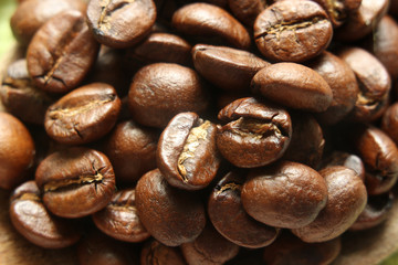 Coffee beans on macro shooting, closer view on a coffee beans.