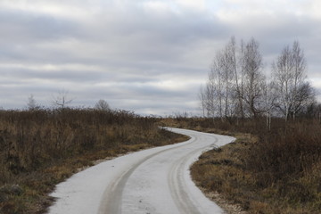 Fototapeta na wymiar Iced roads in the winter fields