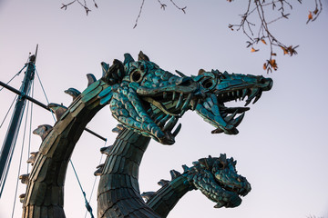 three-headed dragon against the sky