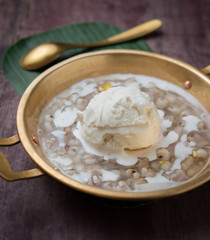 Coconut milk ice cream on brass blow with Thai Desserts,water chestnuts ,grass jelly and sweet potatoes