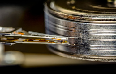 Disassembled hard drive from the computer, hdd with mirror effect. Opened hard drive from the...