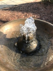 Old Fashioned Metal Water Fountain With Water Bubbling Up