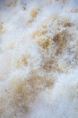 Finnish river running wild in the nature. Close photos of powerful water streams.