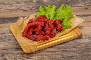 Raw beef meat sliced for cooking