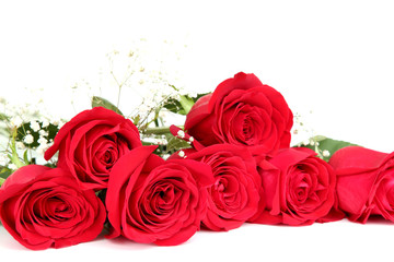 Bouquet of red roses and gypsophila flowers isolated on white background