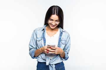 Beauty woman using and reading a smart phone isolated on white background