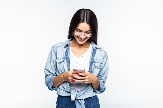 Beauty Woman Using And Reading A Smart Phone Isolated On White Background